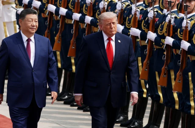 Trump, Xi meet in Beijing to discuss trade and Iran