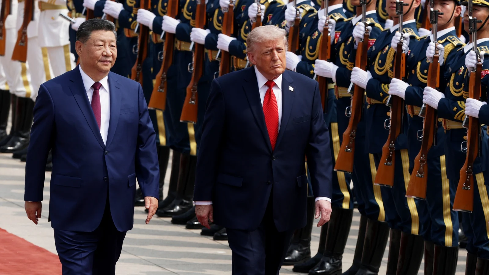 Trump, Xi meet in Beijing to discuss trade and Iran