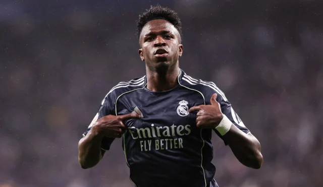Vinicius double keeps Madrid alive as Barcelona wait for La Liga title