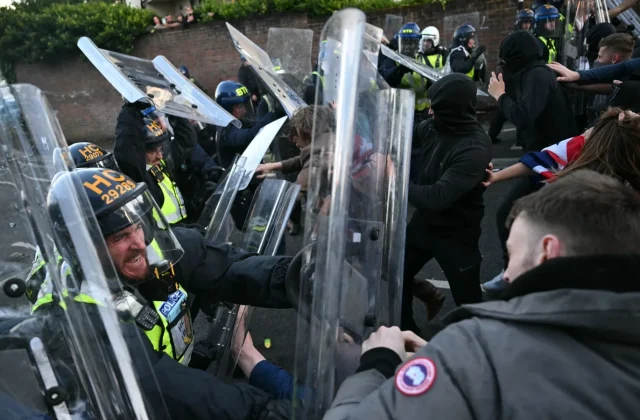 Protesters Clash With Police in England Over Nowak Murder