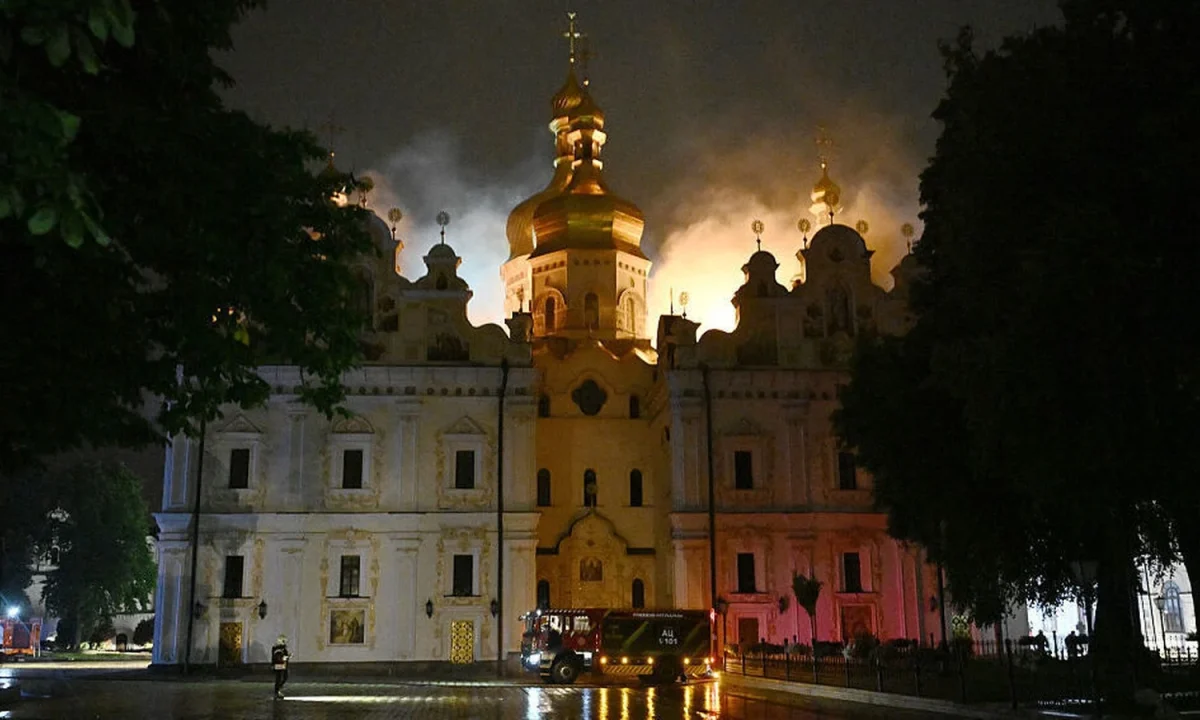 Russian strikes kill 11, set historic Kyiv monastery ablaze
