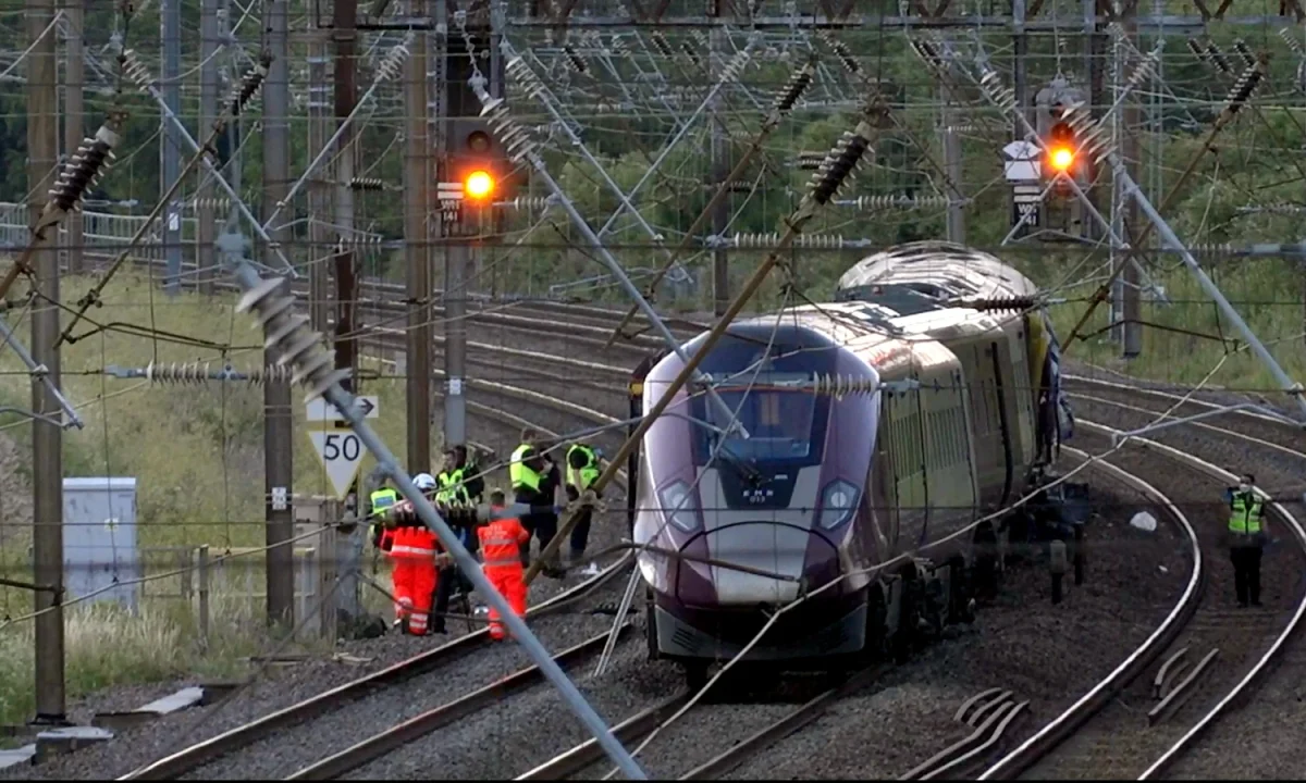 UK train collision kills driver, leaves nine in critical condition
