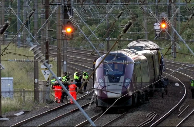 UK train collision kills driver, leaves nine in critical condition