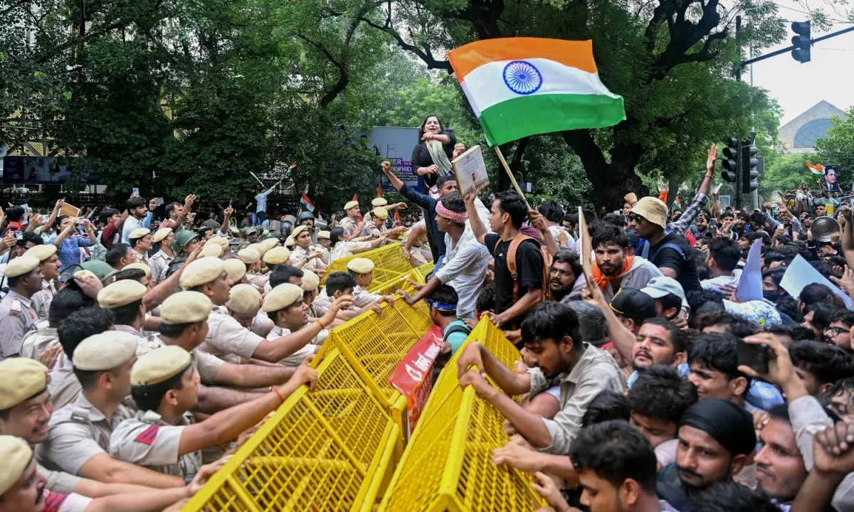 Indian Police Fire Tear Gas, Baton-Charge Exam Protesters
