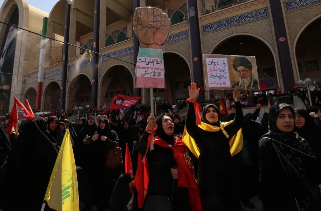 New Iranian leader absent as other sons pay respects to Khamenei