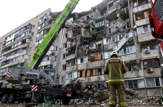 Russian strikes on Kyiv kill 11 ahead of NATO summit