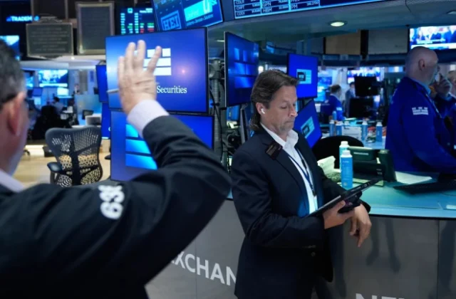 US stocks rise after data shows slowing inflation as IBM plunges