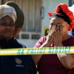 South African police hunt suspects after 27 killed in two shootings