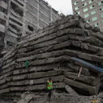 Dozens Feared Trapped as High-Rise Building Collapses