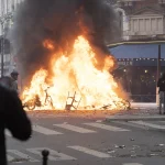 Macron Vows to Punish Those Responsible for Vandalism During Protests